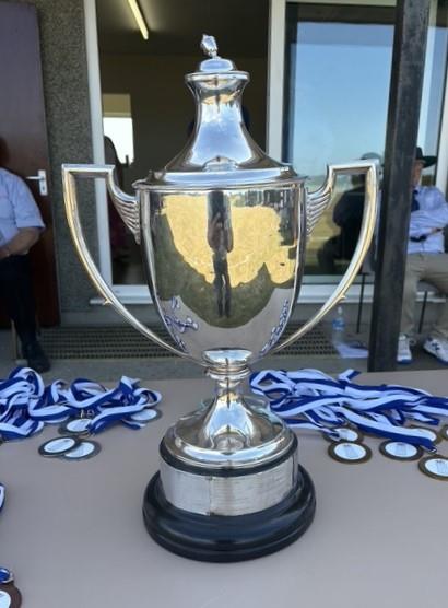 The magnificent silver trophy and players medallions